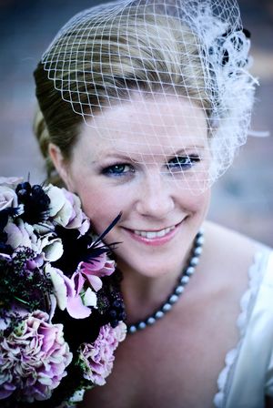 One of our lovely Brides wearing her birdcage veil...