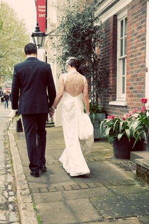 A Beautiful Backless Wedding Dress & A Birdcage Veil...