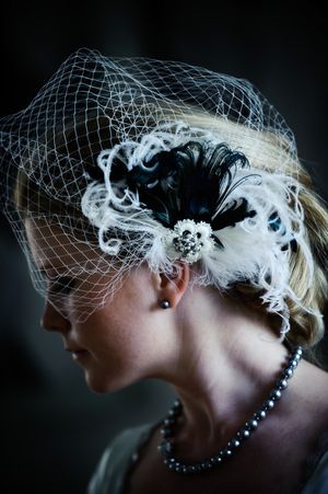One of our lovely Brides wearing her birdcage veil...