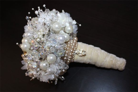 A Jo Barnes Vintage Bouquet - crafted out of vintage fabric, feathers, crystals, pearls and vintage jewellery pieces...
