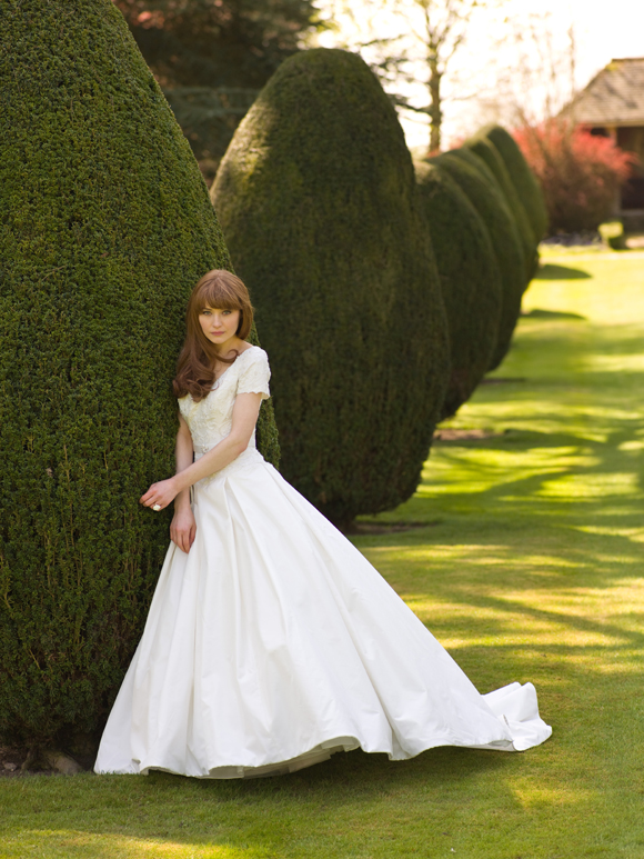 A Madeline Isaac-James bridal gown...