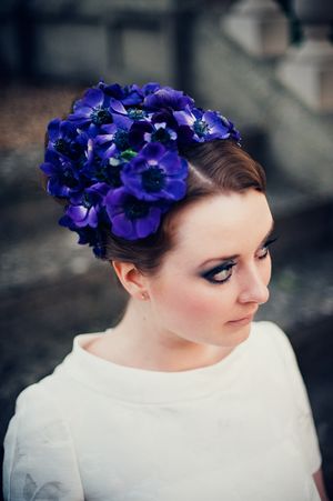 Purple flowers in her hair...