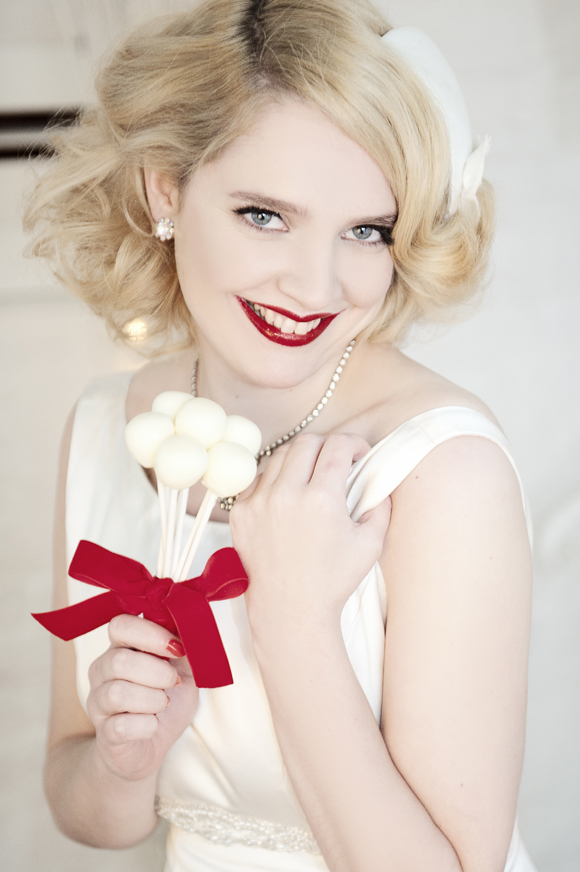 1950s bride with red lipstick and cake pops