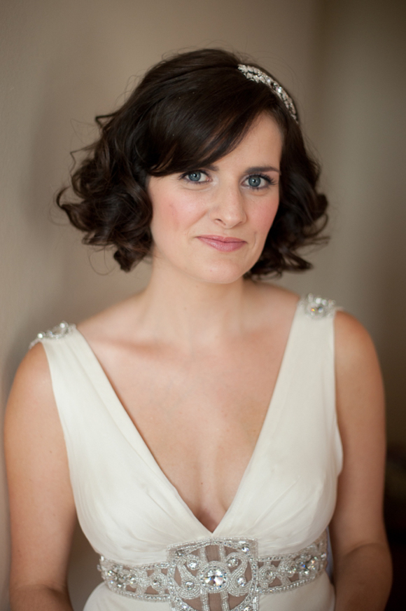 Cleopatra by Jenny Packham worn with a Jo Barnes headpiece