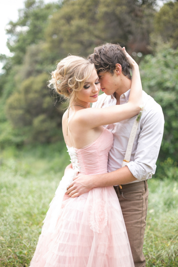 Fairytale secret garden wedding with vintage dress in pink layered tulle