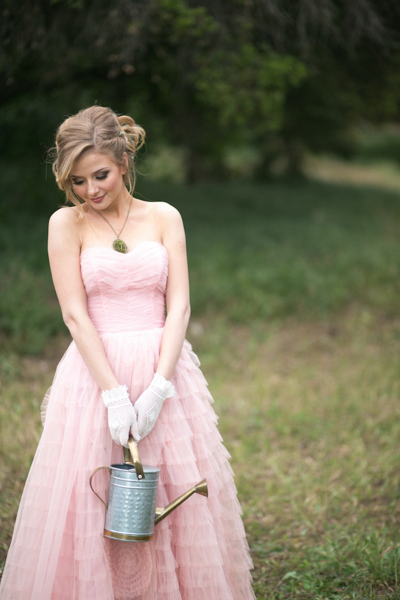 Fairytale secret garden wedding with vintage dress in pink layered tulle