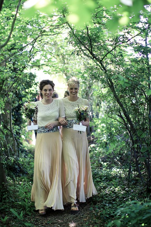 Bridesmaids in peach maxi skirts {bespoke} and chiffon daisy tops from Topshop...