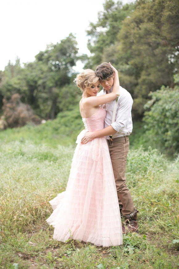 Fairytale secret garden wedding with vintage dress in pink layered tulle