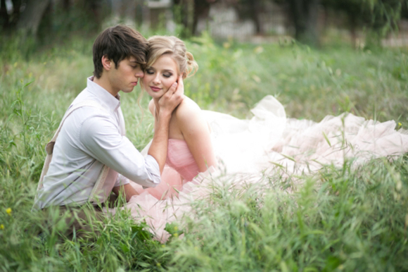 Fairytale secret garden wedding with vintage dress in pink layered tulle