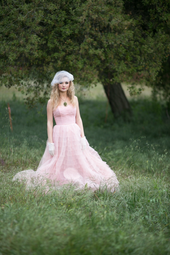 Fairytale secret garden wedding with vintage dress in pink layered tulle