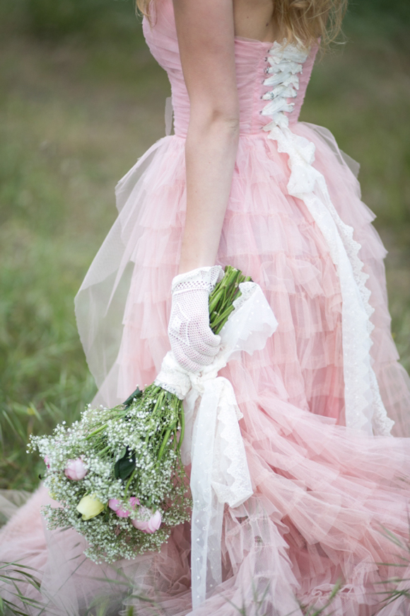 Fairytale secret garden wedding with vintage dress in pink layered tulle