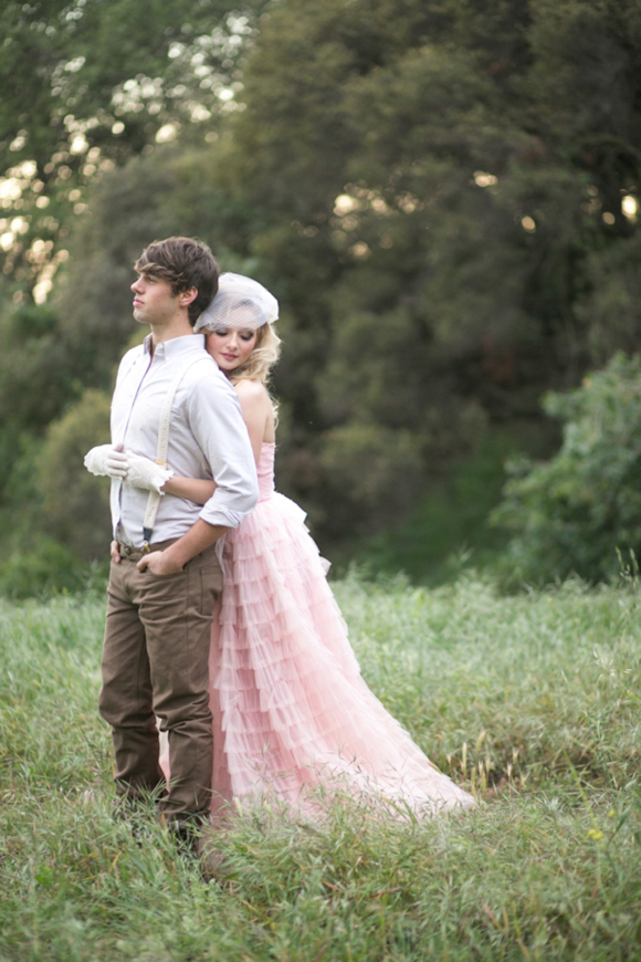 Fairytale secret garden wedding with vintage dress in pink layered tulle