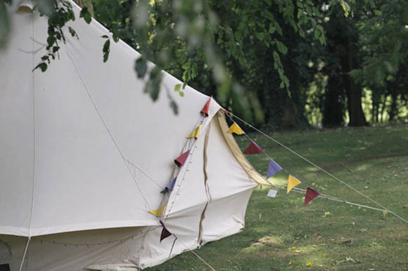 Bell tent village, taxidermy, vintage fair, 1930s style wedding dress