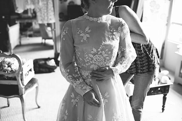 Bride wearing a dress by The Vintage Wedding Dress Company for her vintage wedding