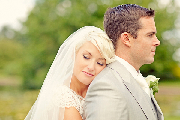 Stewart Parvin wedding dress and pale blue hydrangea wedding bouquets