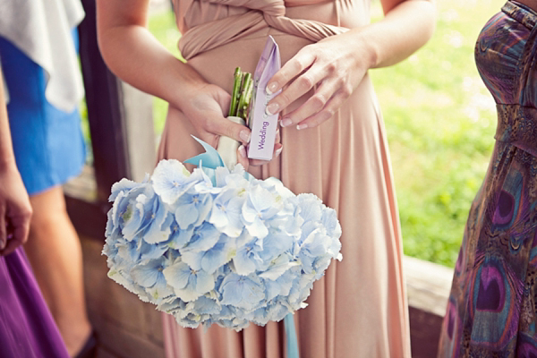 Stewart Parvin wedding dress and pale blue hydrangea wedding bouquets