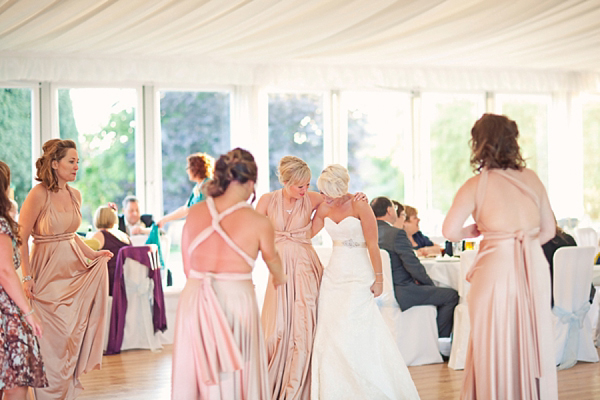 Stewart Parvin wedding dress and pale blue hydrangea wedding bouquets