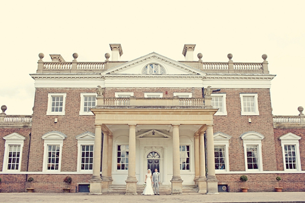 Stewart Parvin wedding dress and pale blue hydrangea wedding bouquets