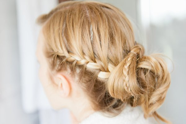 Pale blue Belle and Bunty wedding dress and flowers in her hair