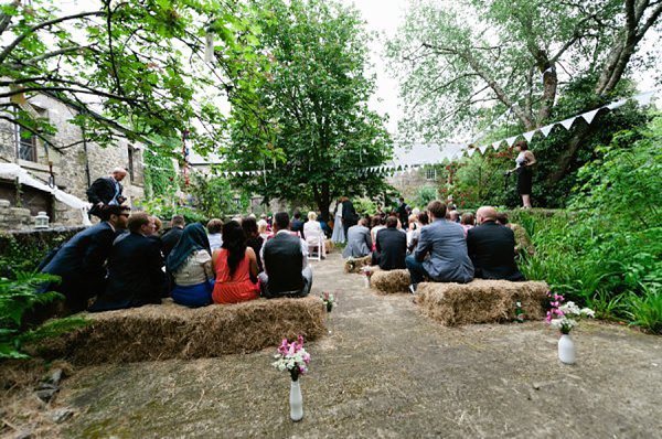 Pale blue Belle and Bunty wedding dress and flowers in her hair