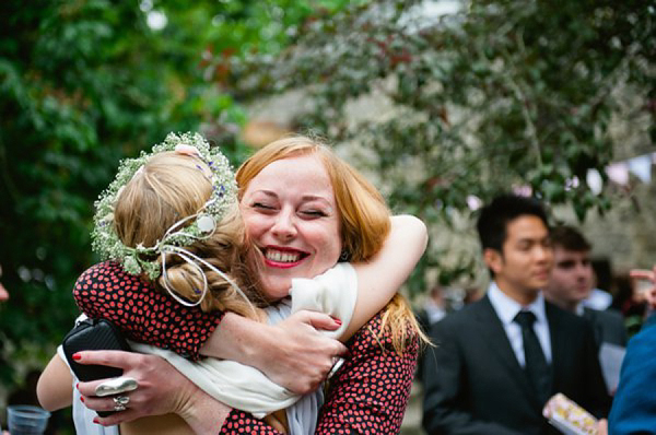 Pale blue Belle and Bunty wedding dress and flowers in her hair