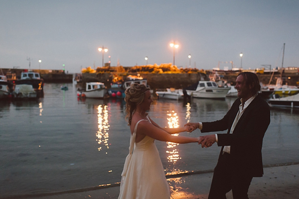 Bare foot bride by the beach