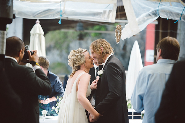 Bare foot bride by the beach