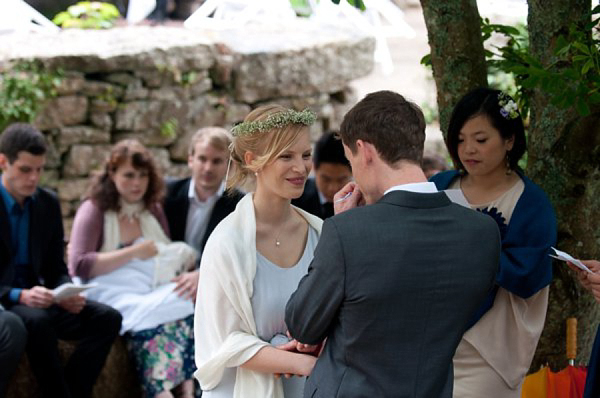 Pale blue Belle and Bunty wedding dress and flowers in her hair