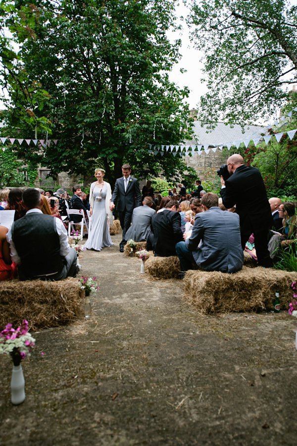 Pale blue Belle and Bunty wedding dress and flowers in her hair