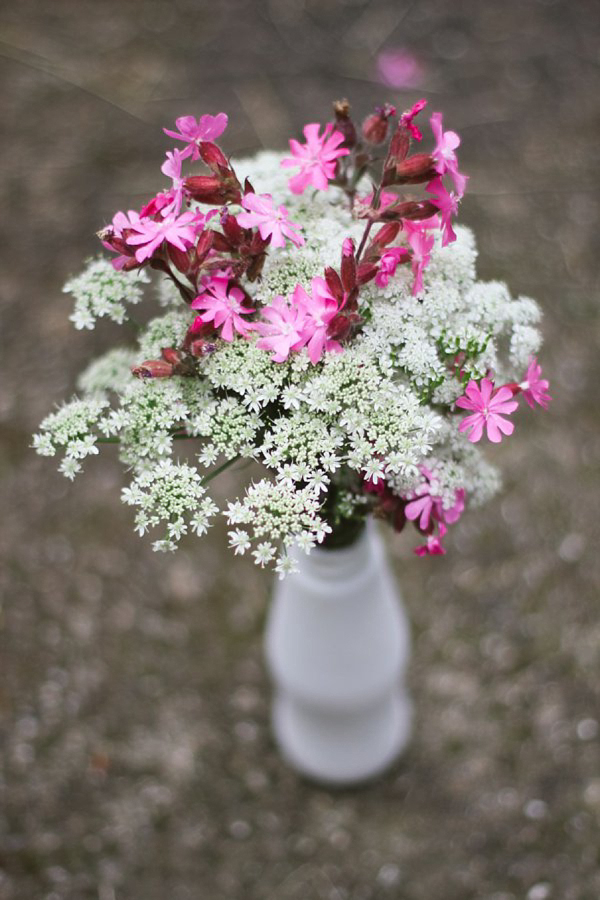 Pale blue Belle and Bunty wedding dress and flowers in her hair