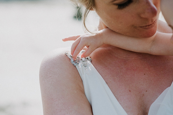 Bare foot bride by the beach