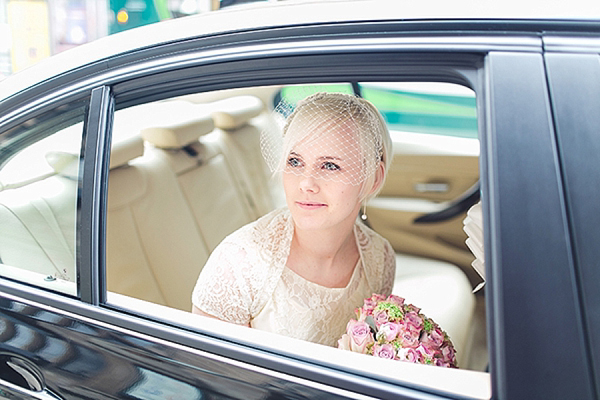 A bride wearing her Mums 1980s wedding dress with photography by Kirsten Mavric