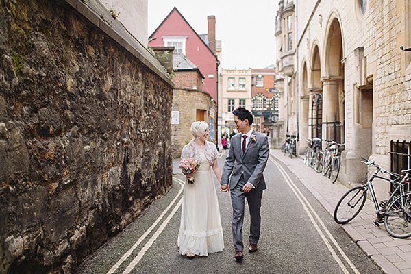 A bride wearing her Mums 1980s wedding dress with photography by Kirsten Mavric