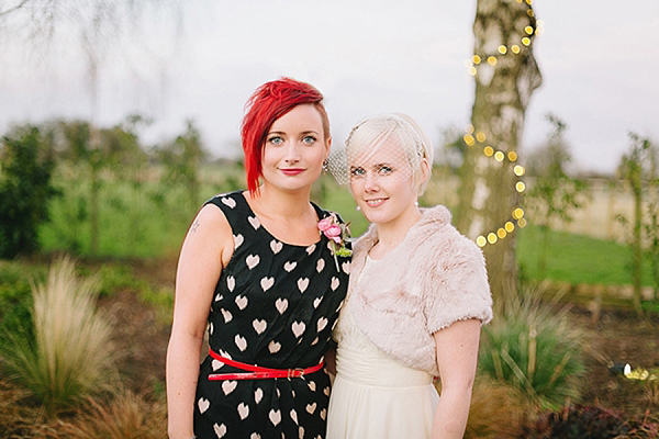 A bride wearing her Mums 1980s wedding dress with photography by Kirsten Mavric