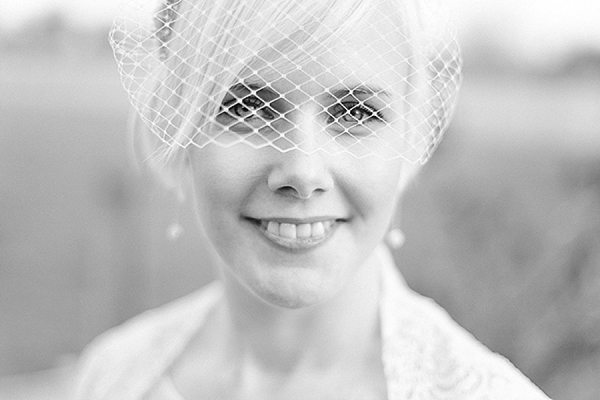 A bride wearing her Mums 1980s wedding dress with photography by Kirsten Mavric