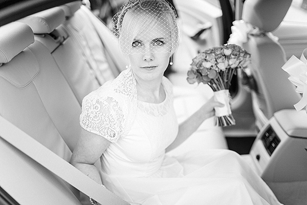 A bride wearing her Mums 1980s wedding dress with photography by Kirsten Mavric