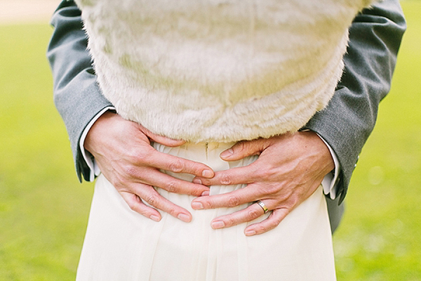 A bride wearing her Mums 1980s wedding dress with photography by Kirsten Mavric