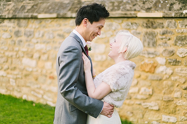 A bride wearing her Mums 1980s wedding dress with photography by Kirsten Mavric