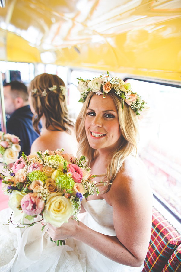 Colourful flower crown Pronvias wedding dress
