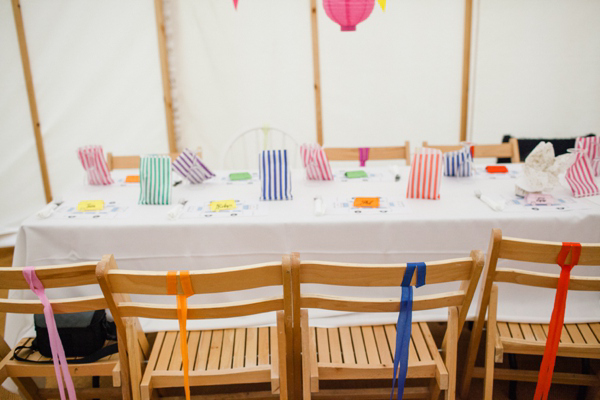 A lego rainbow and cake festival wedding, photograpy by Emma Case