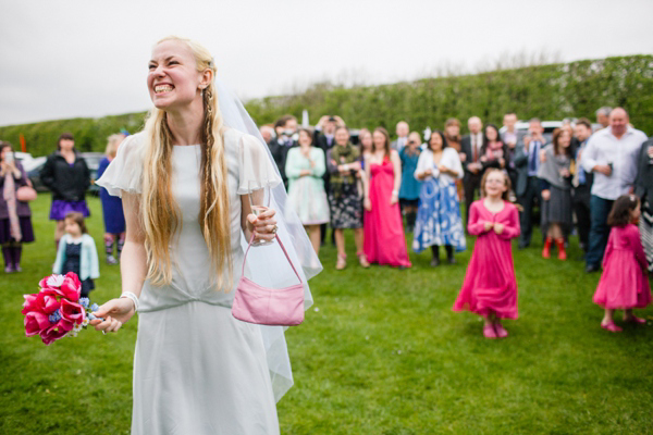 A lego rainbow and cake festival wedding, photograpy by Emma Case