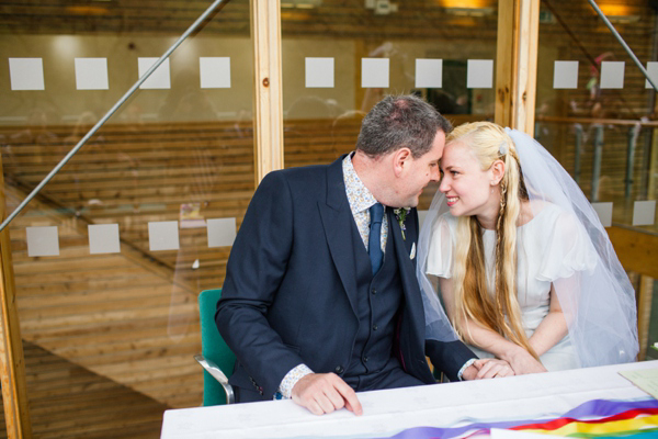 A lego rainbow and cake festival wedding, photograpy by Emma Case