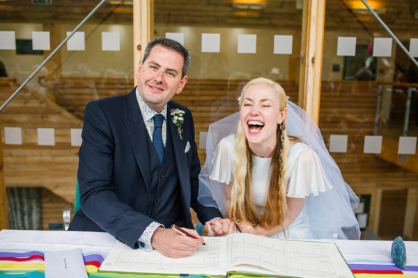 A lego rainbow and cake festival wedding, photograpy by Emma Case