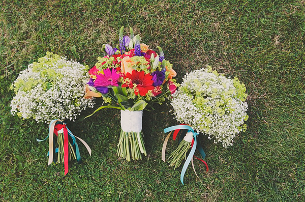 Hand fasting colourful outdoor wedding