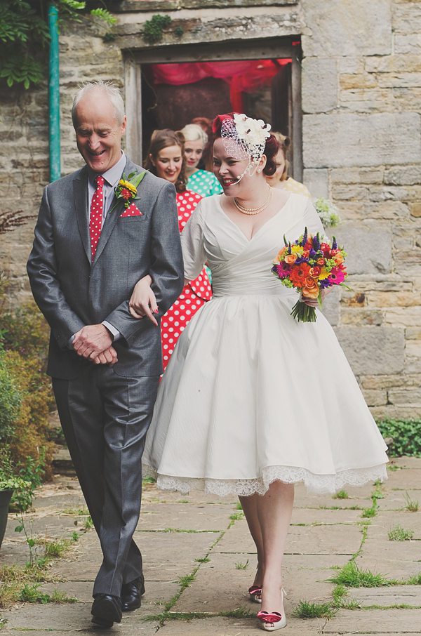 Hand fasting colourful outdoor wedding