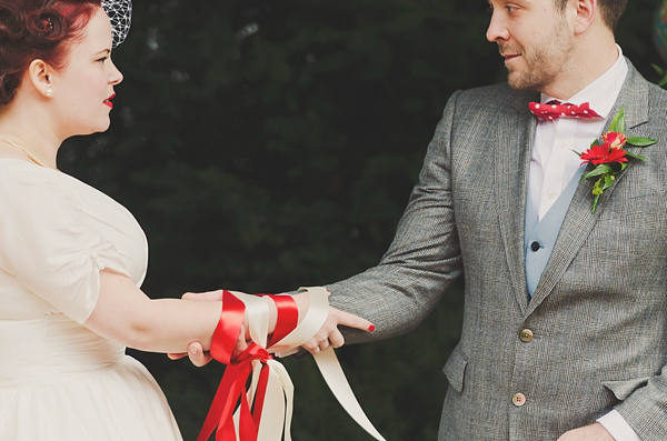 Hand fasting colourful outdoor wedding