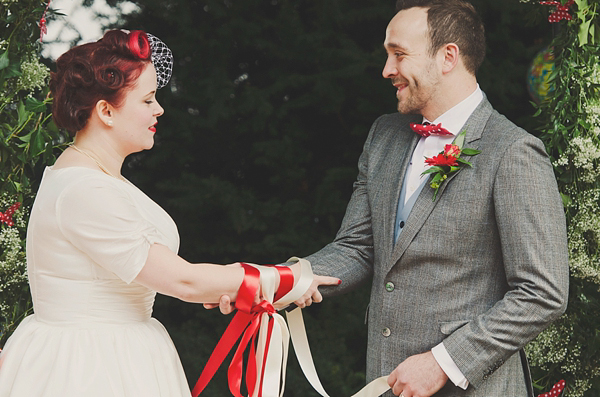 Hand fasting colourful outdoor wedding