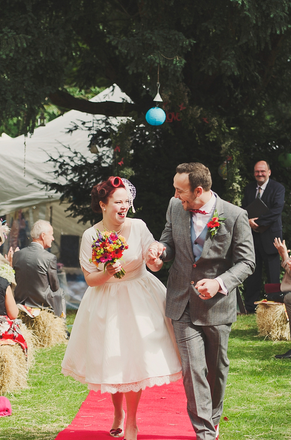 Hand fasting colourful outdoor wedding