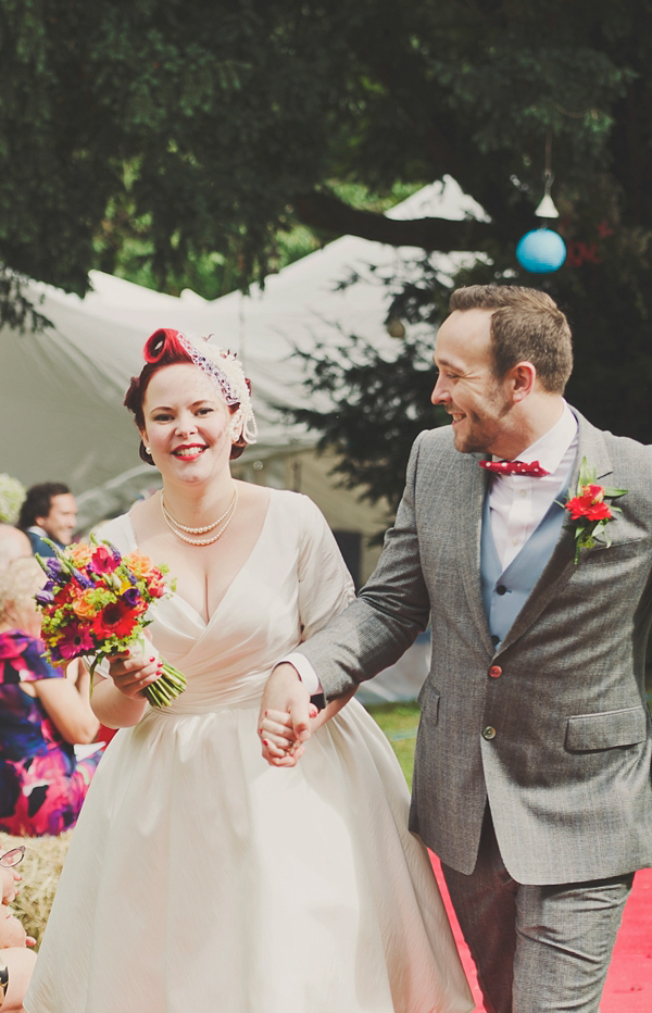 Hand fasting colourful outdoor wedding