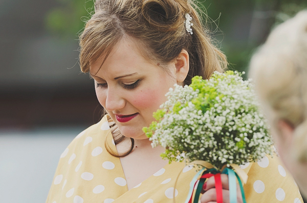 Hand fasting colourful outdoor wedding